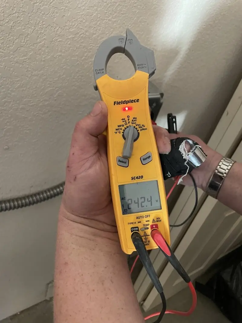 Voltage testing with clamp meter during Generator Installation in Youngsville